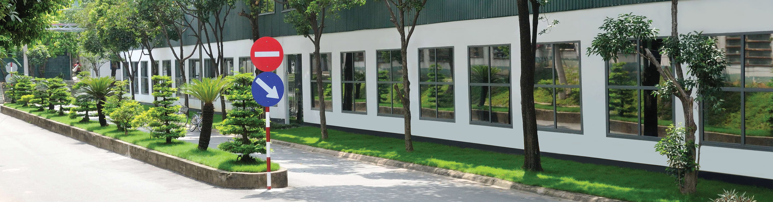 VFR factory exterior with landscaped gardens